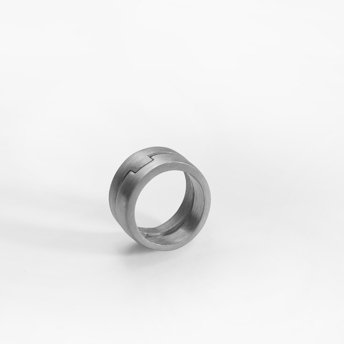 Puzzle ring, sterling silver brushed and satin