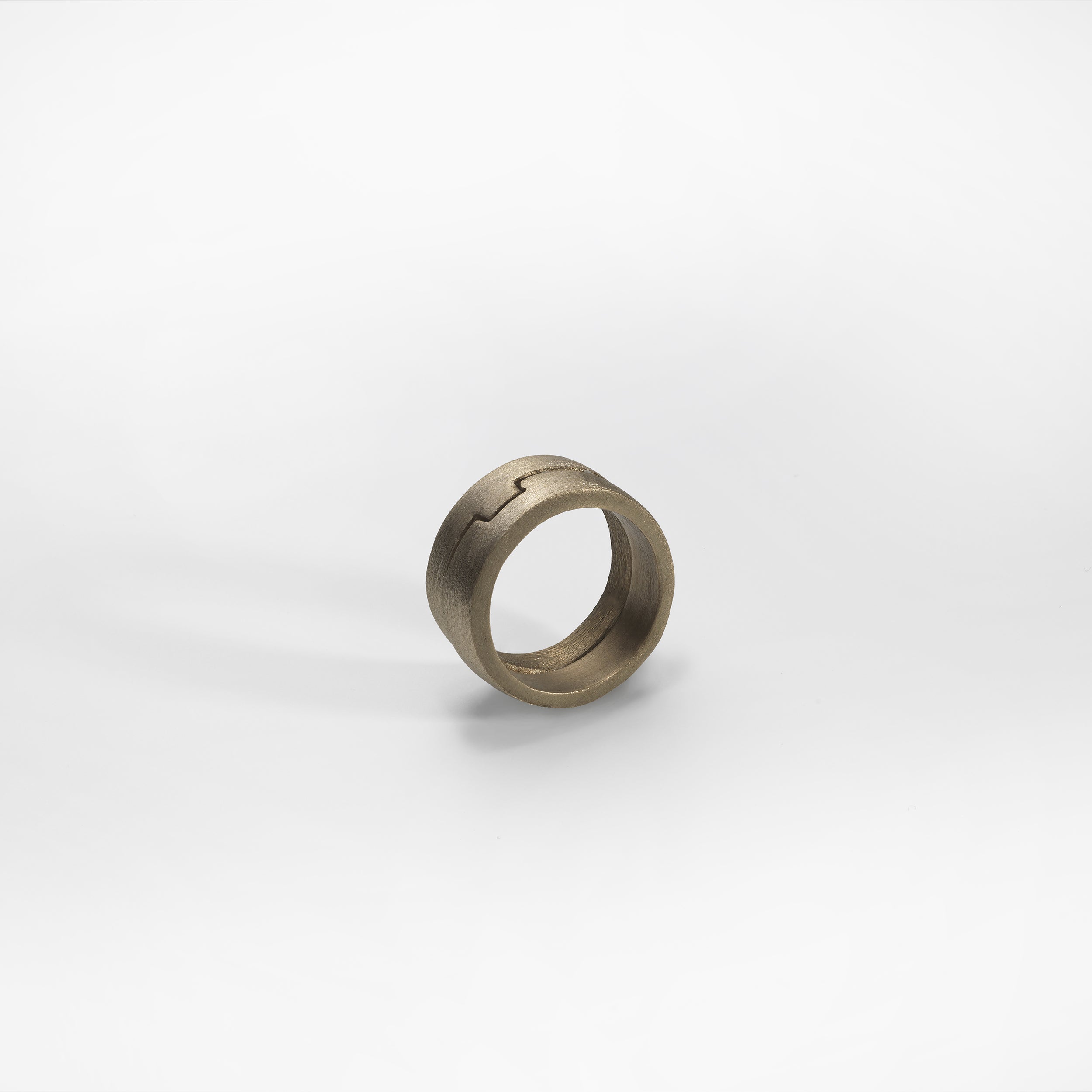 Puzzle ring, bronze brushed