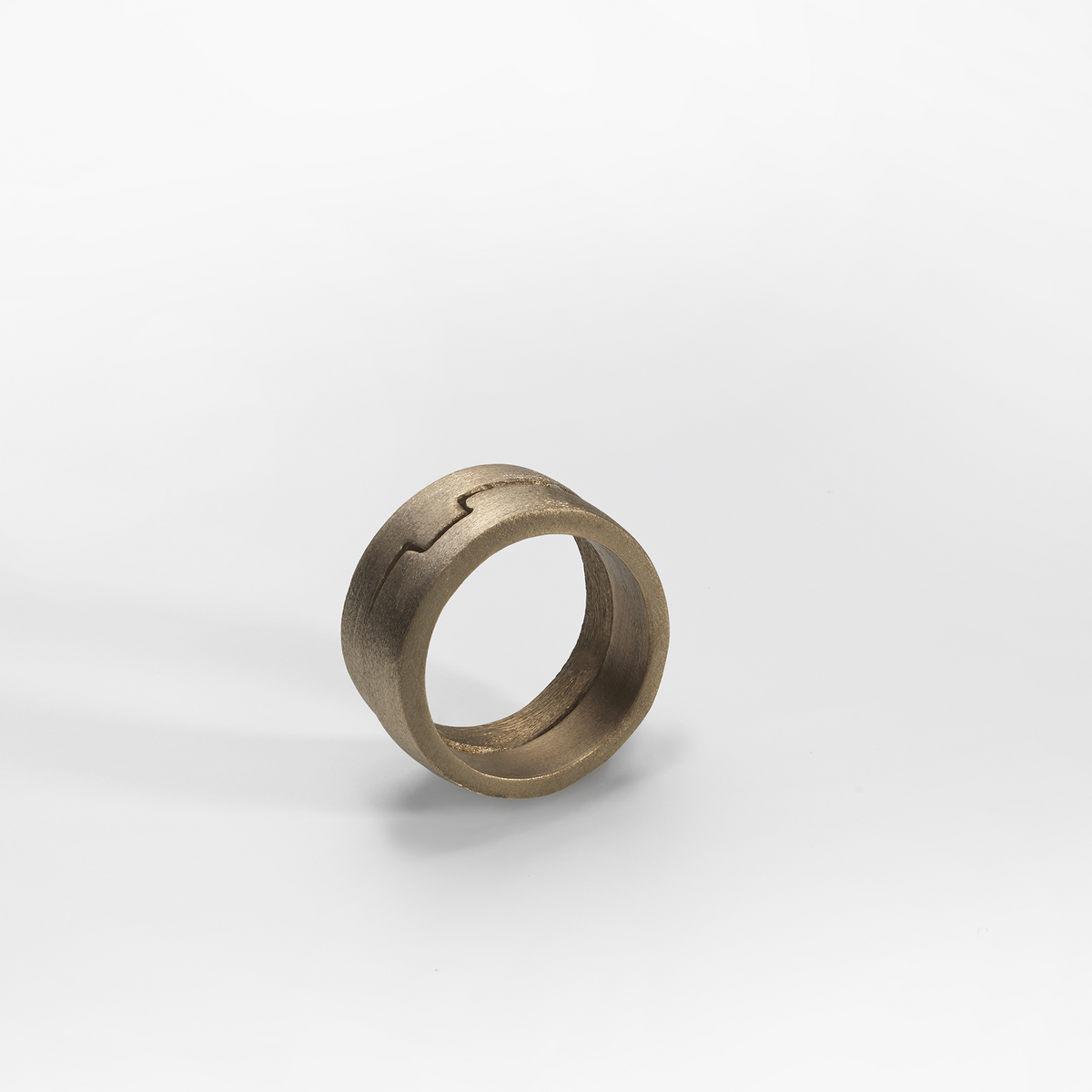 Puzzle ring, bronze brushed