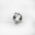 Puzzle ring, sterling silver, set with a red garnet