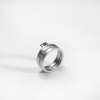 Bague Puzzle, argent, sertie d'un grenat rouge