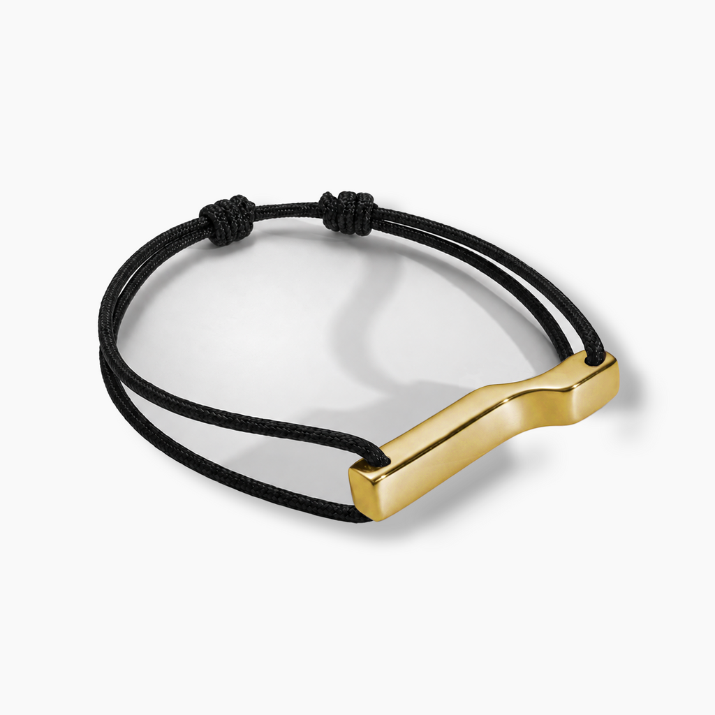 Bracelet Scala, plaqué or jaune, cordon et noeud coulissant.
